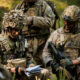 Pictured: Soldiers from 1st Battalion The Royal Welsh check their position before carrying out contact drills in the Drawsko Pomorskie Training Area, Poland on Ex Steadfast Defender. Exercise Steadfast Defender 2024, the largest NATO deployment of its kind in a generation, is a programme of exercises designed to train and demonstrate the Alliance’s ability to reinforce continental Europe via movement of forces from the United Kingdom, Europe and the United States. This demonstrates the ability to move soldiers, their vehicles and equipment quickly across thousands of miles to enable the defence of NATO territory. The UK plays a leading role in NATO and this exercise is about demonstrating the British Army's ability to operate and fight, including providing leadership and operating well with partners from across the alliance. In turn this demonstrates the importance of NATO to the security resilience of the UK.