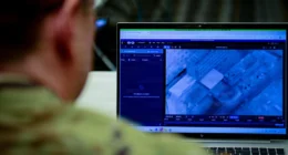 US Army officer views Maven Smart System interface on laptop during training session in Arlington, Virginia. Photo: Master Sgt. Whitney Hughes/DVIDS