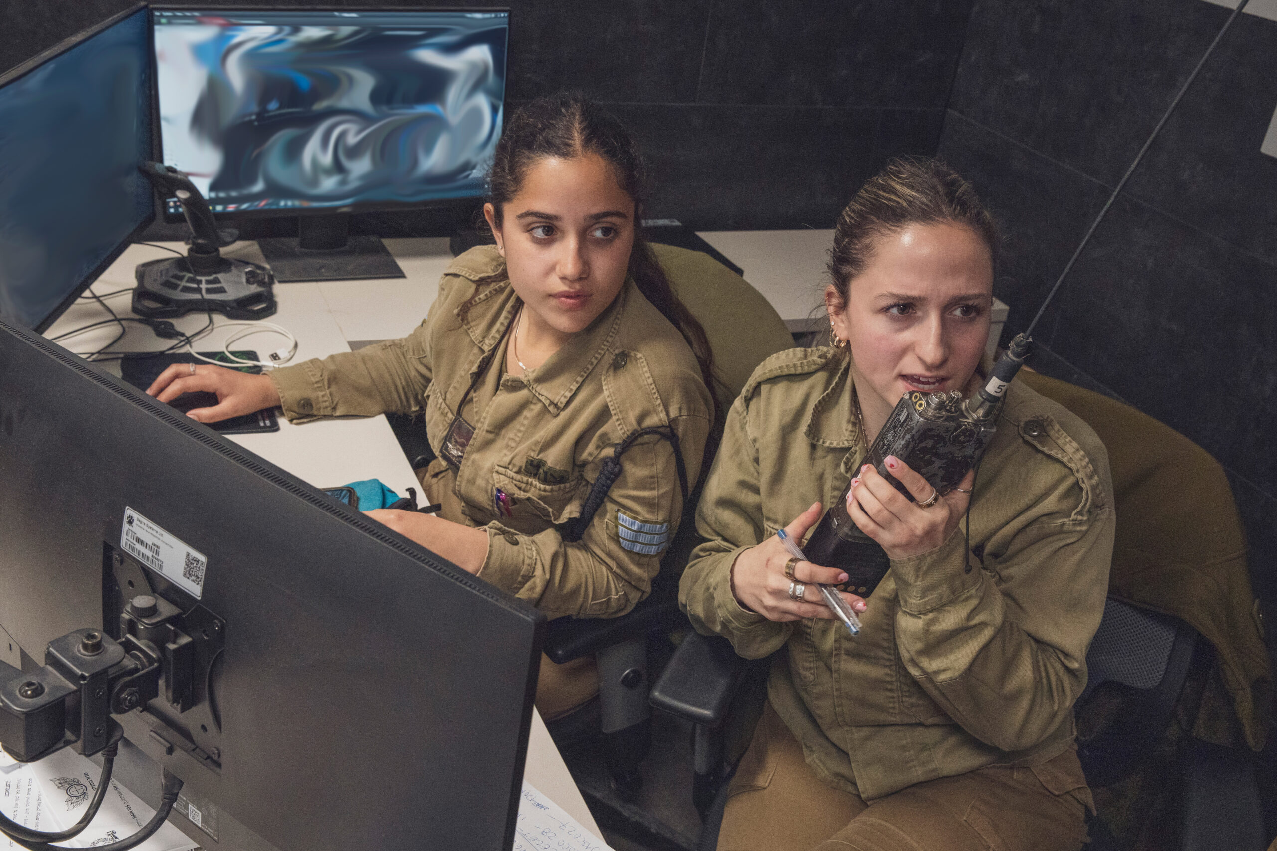 Soldiers with Kosher Kravi, Israeli Defense Force, provide notional fire support to U.S. Marine with 3rd Air Naval Gunfire Liaison Company, U.S. Marine Corps Forces Reserve, during exercise Intrepid Maven 23.2, Feb. 21, 2023. Intrepid Maven is a bilateral exercise between USMARCENT and the IDF designed to improve interoperability, strengthen partner-nation relationships in the U.S. Central Command area of operations and improve both individual and bilateral unit readiness. (U.S. Marine Corps photo by Staff Sgt. Victor Mancilla) (This photo has been altered for security purposes.)