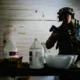 U.S. Navy EOD technician examines chemical containers during a homemade explosives and IED training drill in San Diego.