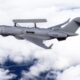 Saab GlobalEye surveillance aircraft in flight equipped with advanced radar and sensors for airborne early warning and ISR missions.