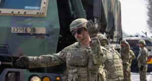 U.S. Army soldiers guide convoy vehicles at a Convoy Support Center during Freedom Shield 2026 in Yeongju, South Korea.