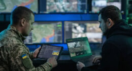 Soldier and trainee in a cyber office