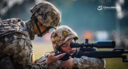 A sniper assigned to a brigade under the Chinese PLA Western Theater Command practice aiming and positioning with a CS/LR4 sniper rifle during a sniper training session.