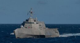 The Independence Class littoral combat ship USS Omaha (LCS 12) transits the Pacific Ocean during a Nimitz Carrier Strike Group (CSG) composite training unit exercise (COMPTUEX). COMPTUEX is an intensive exercise designed to fully integrate units of the CSG, while testing its ability as a whole to carry out sustained combat operations from the sea. (U.S. Navy photo by Mass Communication Specialist 3rd Class Andrew Langholf/RELEASED)