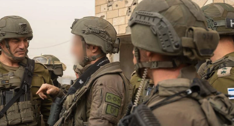 Israeli soldiers coordinate during a field operation.