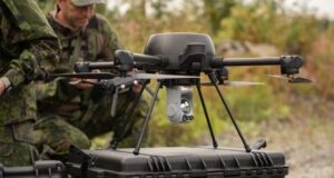 Soldiers prepare a Patria unmanned aerial system during a field exercise.