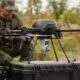 Soldiers prepare a Patria unmanned aerial system during a field exercise.