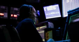 EdgeRunner | Military operator monitors digital systems and sensor displays in a command-and-control environment.