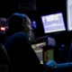 EdgeRunner | Military operator monitors digital systems and sensor displays in a command-and-control environment.