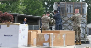 Service members prepare cargo during Enduring Partners 2026 at Camp Murray, Washington, June 4, 2026. The exercise included logistics and humanitarian assistance activities between US and Royal Thai Air Force personnel. Photo: Master Sgt. Brandy Burke/DVIDS