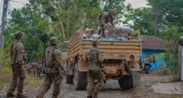 U.S. Army soldiers unload supply boxes from a military truck during a logistics resupply operation in the Philippines, supporting sustainment and distribution missions.