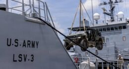 U.S. Army Infantry Squad Vehicle loaded onto Logistics Support Vessel during Salaknib 2026 logistics exercise in the Philippines.