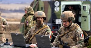 French soldiers monitor the observation point during a live fire exercise of the CAESAR howitzer. Photo: Capt. Regina Koesters/US Army