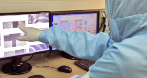 A researcher analyzes laboratory data, reflecting the growing use of artificial intelligence in biodefense, biological threat assessment, and medical countermeasure development.