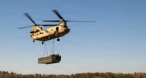 A US Army CH-47F Chinook transports bridging equipment during a sling load operation in Germany. Photo: Staff Sgt. Jamie Robinson/DVIDS