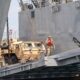 US Army vehicles offload from a logistics support vessel during CJLOTS 2026 in South Korea