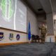 A US Air Force airman presents an AI-generated training tool during the Artificial Intelligence and Automation Showcase at Tyndall Air Force Base, Florida, on June 17, 2026. Photo: Airman 1st Class Courtney McCants/US Air Force