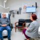 clinical assistant | A healthcare provider uses the MHS GENESIS Ambient Listening tool during a patient appointment at Kenner Army Health Clinic.