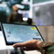 A military operator uses a digital targeting interface during a defense technology demonstration. Image: Aurex