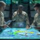 Illustration of US Army soldiers using the AI-supported COA-GPT battlefield planning system during collaborative mission planning.