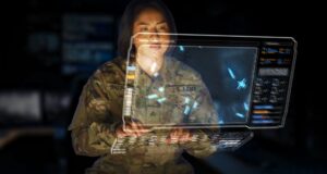 Soldier using a digital command-and-control interface for Northrop Grumman's Integrated Battle Command System (IBCS).