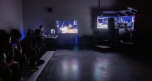 U.S. Marines with 10th Marine Regiment, 2d Marine Division, wait to use the new Multi-Platform Driving Simulator at Marine Corps Base Camp Lejeune, North Carolina, March 26, 2026.