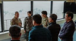 U.S. and Republic of Korea personnel discuss operations during Freedom Shield 2026 in South Korea.