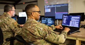US service members work at computer stations. Photo: Pentagon