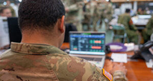 logistics | US Army 11th Airborne Division soldier using a computer during an exercise