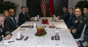 US Secretary of Defense Lloyd J. Austin III greets Chinese Defense Minister Adm. Dong Jun ahead of bilateral meetings in Singapore on May 31, 2024.